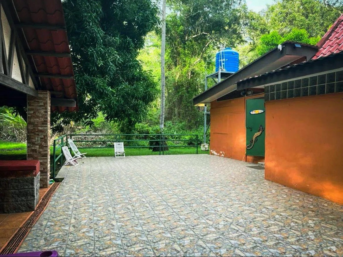 EXCLUSIVE OPPORTUNITY IN PLAYA AZUL: 7,658 m² LOT + 3 HOUSES & POOL INCLUDED! - image 3
